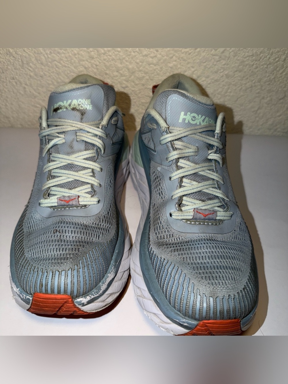 Hoka One One Light Blue and White Men's Running Shoes with Orange Accents